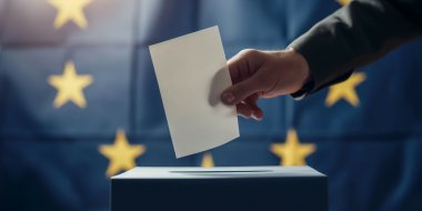 European vote - Arm holding a ballot voting paper centered within the EU flag's in the background, symbolizing active participation in EU elections